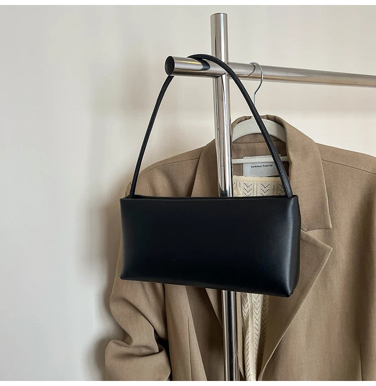 Elegant and stylish leather tote bag designed for moms who want both fashion and practicality in everyday use.