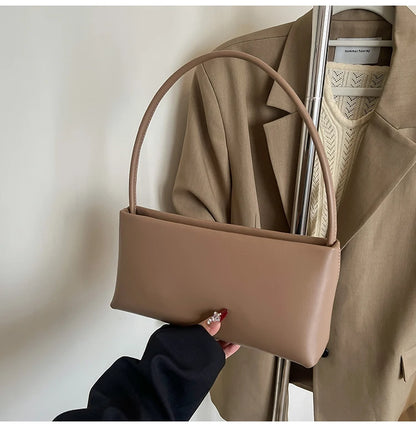 Elegant and stylish leather tote bag designed for moms who want both fashion and practicality in everyday use.